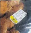  ?? PHOTOS: HAYLEY BEVIN ?? Old produce . . . A bag of chicken at a Dunedin Pizza Hut which allegedly had a new expiry plastered over the old date.