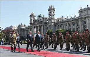  ?? (Haim Zach/GPO) ?? PRIME MINISTER Benjamin Netanyahu and his host, Prime Minister Viktor Orban, inspect a guard of honor in front of the Hungarian Parliament Building in Budapest yesterday.