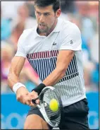  ??  ?? LOOKING BETTER: Djokovic shook off his troubles by beating Pospisil at Eastbourne yesterday