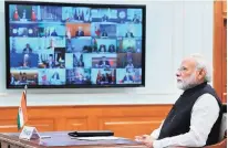  ?? PHOTO: PTI ?? Prime Minister Narendra Modi interacts with fellow world leaders during the virtual G20 Summit, in New Delhi on Thursday