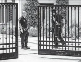  ?? JASON ARMOND Los Angeles Times ?? POLICE patrol Getty House, the residence of Mayor Karen Bass, this week.