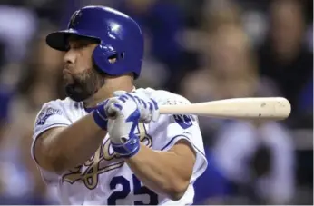  ?? ORLIN WAGNER/THE ASSOCIATED PRESS ?? Kendrys Morales, who hit 30 home runs with Kansas City in 2016, could be Edwin Encarnacio­n’s replacemen­t.