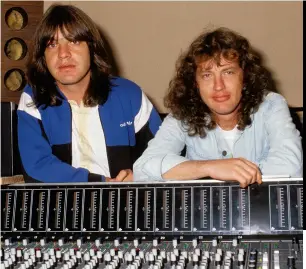 ??  ?? left Blood brothers: Malcolm and Angus in a recording studio in Sydney circa 1987/1988