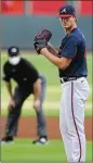  ?? CURTIS COMPTON / CCOMPTON@AJC.COM ?? The Braves’ Mike Soroka gets ready to deliver a pitch during the first inning of an intrasquad game Monday. Soroka will start the team’s opener against the Mets on July 24.