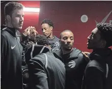  ?? CANADIAN PRESS FILE PHOTO ?? Raptors players huddle outside the locker-room before their NBA game against the Oklahoma City Thunder in Toronto on March 18.