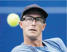  ?? MARK BLINCH / THE CANADIAN PRESS FILES ?? Canada’s Peter Polansky is the luckiest loser in tennis this season, receiving a main-draw entry into each of the last three Grand Slams despite losing his final qualifier.