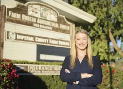  ?? PHOTO ?? Imperial Valley native Brea Mohamed poses outside of the Imperial Valley Farm Bureau in El Centro on Friday after being named the Bureau’s new executive director. VINCENT OSUNA