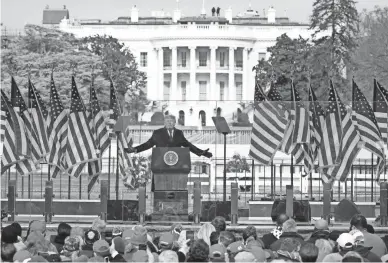  ?? JACQUELYN MARTIN, AP ?? With the White House in the background, President Donald Trump speaks at a rally Wednesday in Washington.
