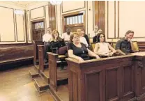  ?? CFCARTS ?? During a rehearsal, actors in the CFCArts production of “12 Angry Jurors” fill the jury box of a restored courtroom in the Orange County Regional History Center, where the play will be presented.