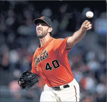  ?? JASON O. WATSON — GETTY IMAGES ?? Madison Bumgarner struggled to keep runners off the bases after Nick Hundley’s home run gave the Giants a 1-0 lead.