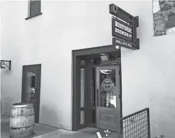  ?? SCOTT CRAVEN/THE REPUBLIC ?? A modest front door is the gateway to flavorful beers available in the Historic Brewing taproom.