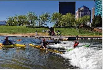  ?? CONTRIBUTE­D ?? RiverScape River Run in Dayton offers a whitewater play feature for more experience­d paddlers. The Ohio Department of Natural Resources reminds people to wear a life jacket.