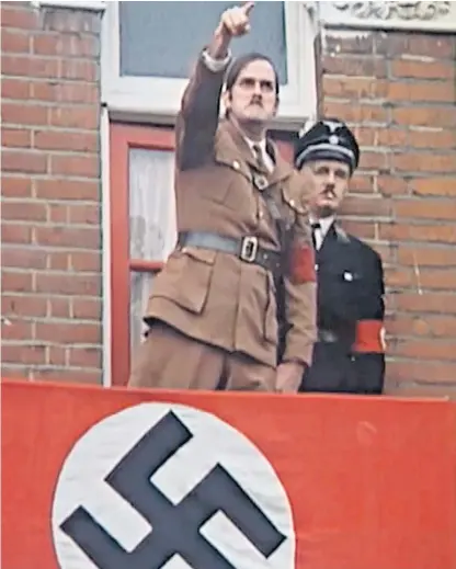  ?? ?? John Cleese played Hitler in a sketch in which the Nazi leader, posing as “Mr Hilter”, campaigns for office in the North Minehead by-election