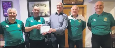  ?? ?? Yet another happy lotto winner. Pictured is Billy Ryan receiving his recent lotto jackpot win of €1,000 from club treasurer Dave O’Connor; also included are Paddy Moloney, John Crowley and John Ryan.