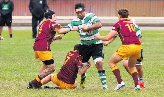  ?? Photo / File ?? Marist’s Taione Ratu taking the ball up against Kaierau in the season opener at Spriggens Park. Marist will be looking for payback for that loss in tomorrow’s crucial game at the Country Club.