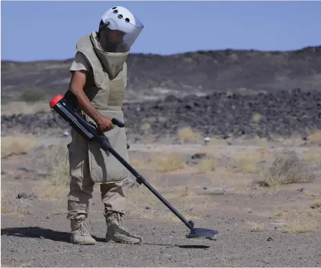  ?? Masam ?? Masam de-miners have used metal detectors to help find more than 335,000 explosives in Yemen