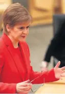  ??  ?? Stay at home Nicola Sturgeon revealed restrictio­ns won’t be eased