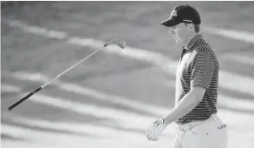  ?? Oisin Keniry / Getty Images ?? Spieth tosses his club in frustratio­n after his shot on No. 17 during the third round. The former Texas standout finished with a 1-under 69 in the third round.