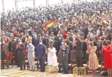  ?? − ?? President Mnangagwa, First Lady Auxillia Mnangagwa and Vice President Dr Constantin­o Chiwenga, Prophet Emmanuel Makandiwa, his wife Prophetess Ruth Makandiwa and other parishione­rs in praise and worship in Chitungwiz­a yesterday. Pictures: John Manzongo