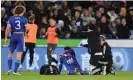  ?? Photograph: Michael Regan/Getty Images ?? James Justin of Leicester City goes down with an injury before being taken off on a stretcher.