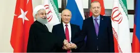  ??  ?? Il patto Da destra, il presidente turco Erdogan, il russo Putin e l’iraniano Rohuani