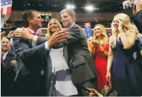  ?? (Brian Snyder/Reuters) ?? DONALD TRUMP’S children celebrate after their father clinched the presidenti­al nomination at the Republican National Convention in Cleveland, Ohio, Tuesday night.