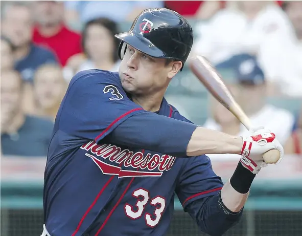  ?? — GETTY IMAGES FILES ?? After a 14-season career, most of it with the Minnesota Twins, New Westminste­r’s Justin Morneau is set to announce his official retirement from Major League Baseball Wednesday, as he embarks on the next phase of his life working in the Twins’ front...