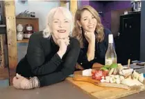  ?? SUSAN STOCKER/SOUTH FLORIDA SUN SENTINEL ?? Chef Lenore Nolan Ryan of Grapes Wine Cafe & Market and Arlene Borenstein build a charcuteri­e board on this week’s episode of Let’s Go, South Florida.