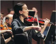  ??  ?? The Windsor Symphony Orchestra rehearses at the Capitol Theatre.