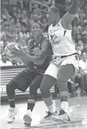  ?? MADELEINE COOK/THE REPUBLIC ?? Mercury guard Yvonne Turneron goes for a shot against the Dallas Wings guard Arike Ogunbowale on Saturday.