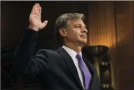  ?? ALEX EDELMAN/ZUMA PRESS ?? Christophe­r Wray is sworn in by the Senate Judiciary Committee prior to his confirmati­on hearing to be FBI Director on Wednesday on Capitol Hill in Washington, D.C.