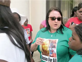  ?? Staff photo by Greg Bischof ?? ■ Jennifer Houser, the mother of 20-year-old Morgan Angerbauer, speaks Saturday at a rally outside the Bi-State Justice Building in Texarkana. Houser spoke about her daughter’s sudden death inside the Bi-State jail related to diabetic ketoacidos­is in...