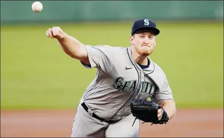  ??  ?? Seattle Mariners’ Ljay Newsome pitches against the San Francisco Giants during the first inning of a baseball game in San Francisco on Sept 16. (AP)