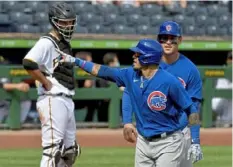  ?? Matt Freed/Post-Gazette ?? Javier Baez crosses home plate after hitting a two-run home run off Pirates starter Tyler Anderson in the sixth inning of the Cubs’ 4-2 win Thursday at PNC Park.