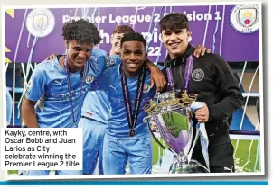  ?? ?? Kayky, centre, with Oscar Bobb and Juan Larios as City celebrate winning the Premier League 2 title