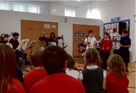  ??  ?? Above: A performanc­e at Leadhills Primary School