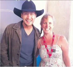  ??  ?? Country musician Paul Brandt meets with Herald columnist Valerie Fortney — one of the great perks of a job that includes telling the stories of Calgary’s famous faces.