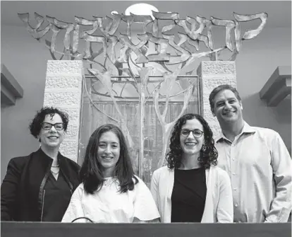  ?? ULYSSES MUÑOZ/BALTIMORE SUN ?? Rabbi Rachel Sabath Beit-Halachmi, left, congregati­on board member Katie Applefeld, Cantor Alexandra S. Fox and congregati­on President Dr. David Buchalter stand at Har Sinai-Oheb Shalom on April 29.