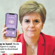  ??  ?? App in hand Nicola Sturgeon is urging people to download the app