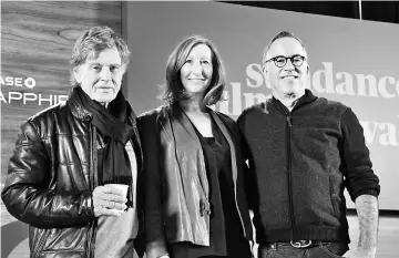 ??  ?? (From left) Sundance founder Redford, executive director Keri Putnam and Sundance Film Festival director John Cooper attend the opening day press conference to kick-off the 2018 Sundance Film Festival in Park City, Utah on Thursday. (Below) Redford attends the press conference. — AFP photos