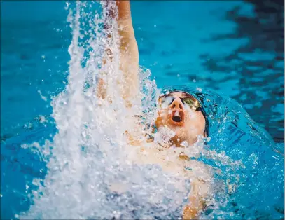  ?? PHOTOS BY UT ATHLETICS — CONTRIBUTE­D ?? Aptos High alum Chris Staka competes for University of Texas in the Big 12 Championsh­ips in late February in Austin.