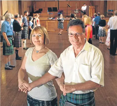 ?? Picture: Kris Miller. ?? Maggie Scott and Paul Plummer taking part in the Royal Scottish Country Dance Society at St Andrews.