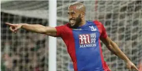  ?? AP PIC ?? Crystal Palace's Andros Townsend celebrates after scoring against Arsenal on Monday. Palace won 3-0.