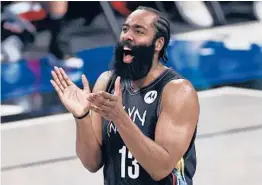  ?? ADAM HUNGER/AP ?? James Harden recorded a triple-double (34 points, 10 rebounds, 10 assists) in the Nets’ seriesclin­ching win over the Celtics on Tuesday night. They next face the Bucks.