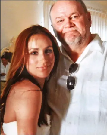  ?? ?? BEFORE THE RIFT: Meghan Markle with her father Thomas in 2011