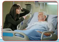  ??  ?? Bedside Manner: Quinn (Rena Sofer) was by Eric’s side after he collapsed and fell into a coma.