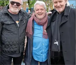  ?? ?? CeremOnY: John McColgan, Bill Whelan and Johnny Logan, left to right, at a memorial to the late Shay Healy in Dublin’s Sandymount yesterday