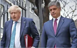  ?? ?? Unity...Boris Johnson with Ukrainian ambassador Vadym Prystaiko