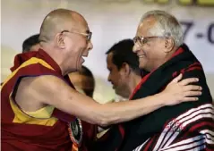  ??  ?? Fernandes in Bangalore in 2008, greeted by his friend the Dalai Lama (Getty)