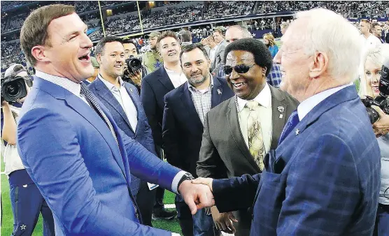  ?? RON JENKINS/THE ASSOCIATED PRESS ?? Dallas Cowboys owner Jerry Jones, right, should be taking the heat for the team’s struggles, says retired quarterbac­k Troy Aikman, not pictured.